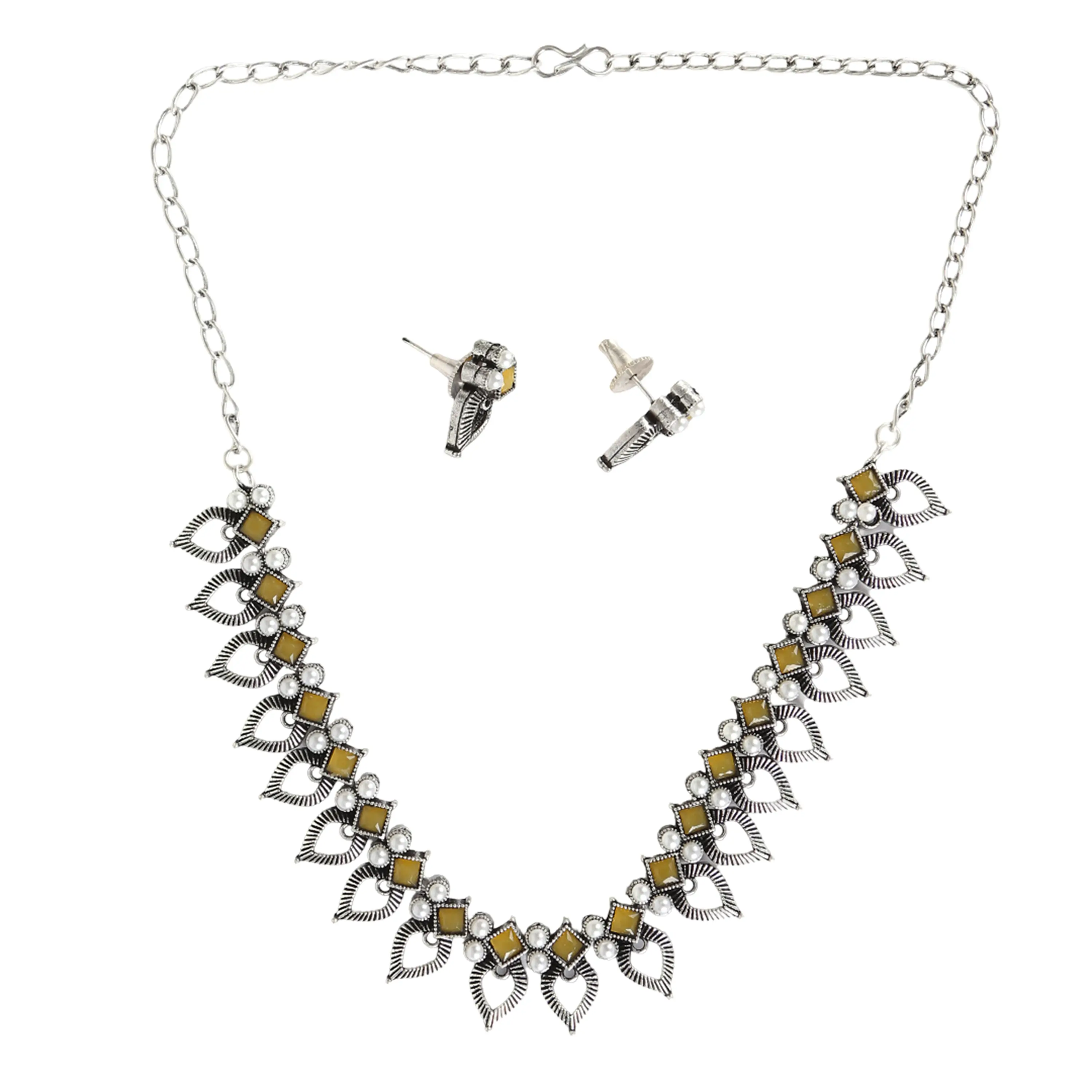 Oxidised silver necklace with yellow stones on white background — jewellery photography