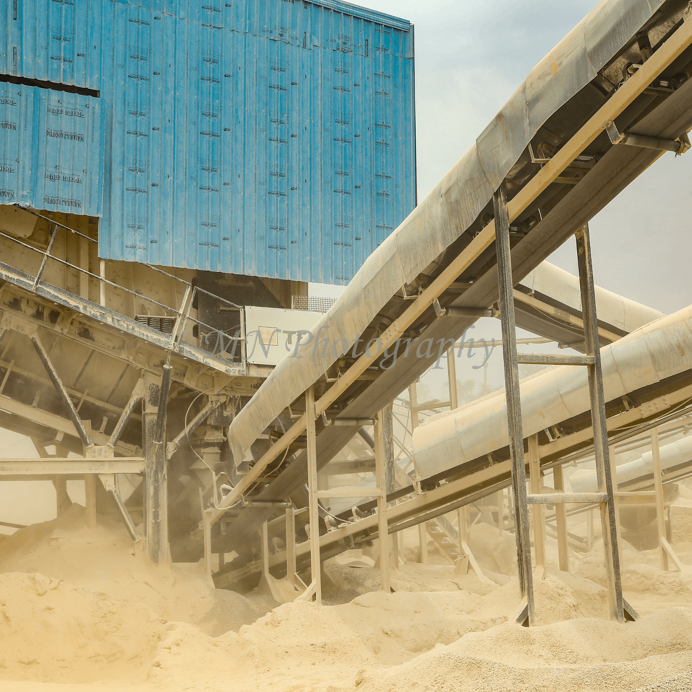 Industrial operations photography showing conveyor systems and material handling infrastructure