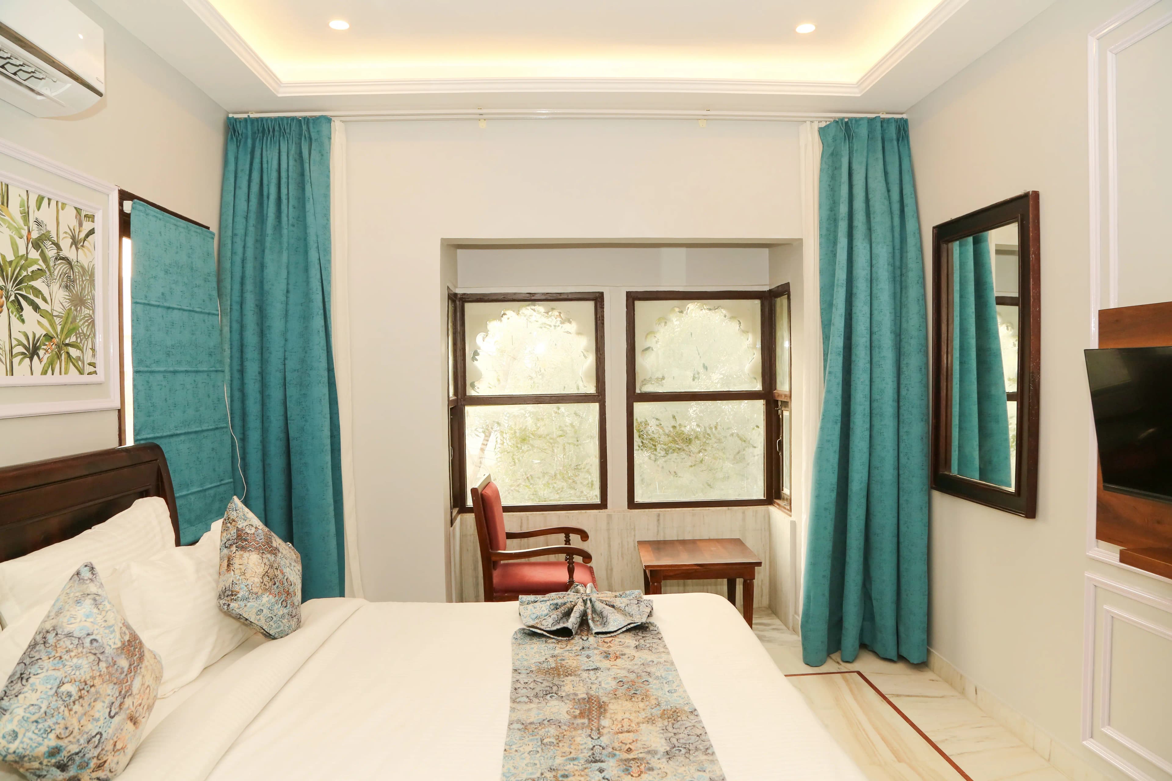  Bedroom interior with arched windows photography in Udaipur